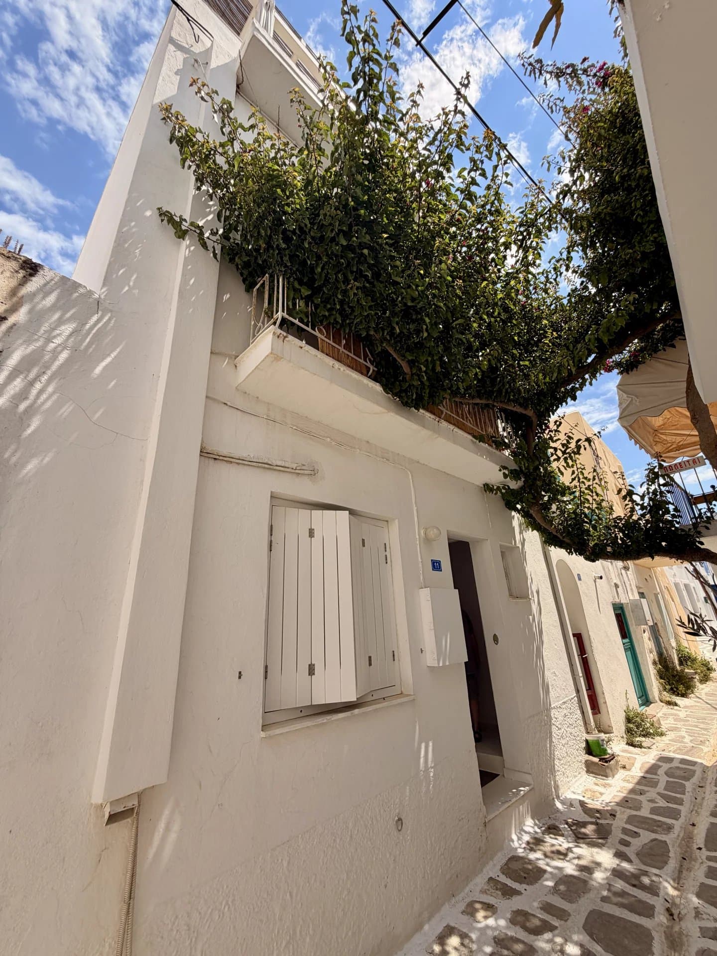 Traditional Cycladic Townhouse for Sale in the Heart of Parikia – Roof Terrace with Sea & Village Views - Image 27