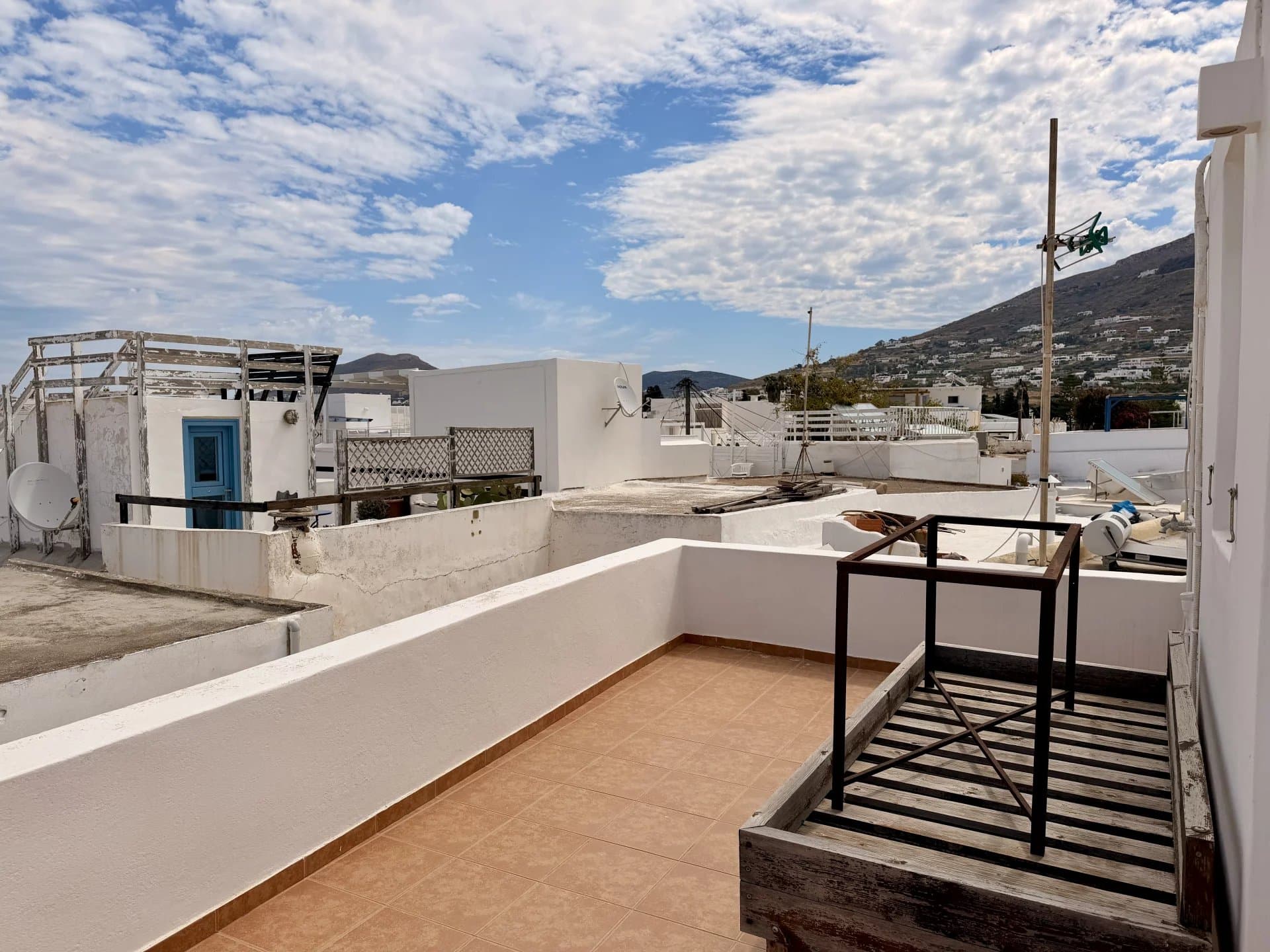 Traditional Cycladic Townhouse for Sale in the Heart of Parikia – Roof Terrace with Sea & Village Views - Image 24