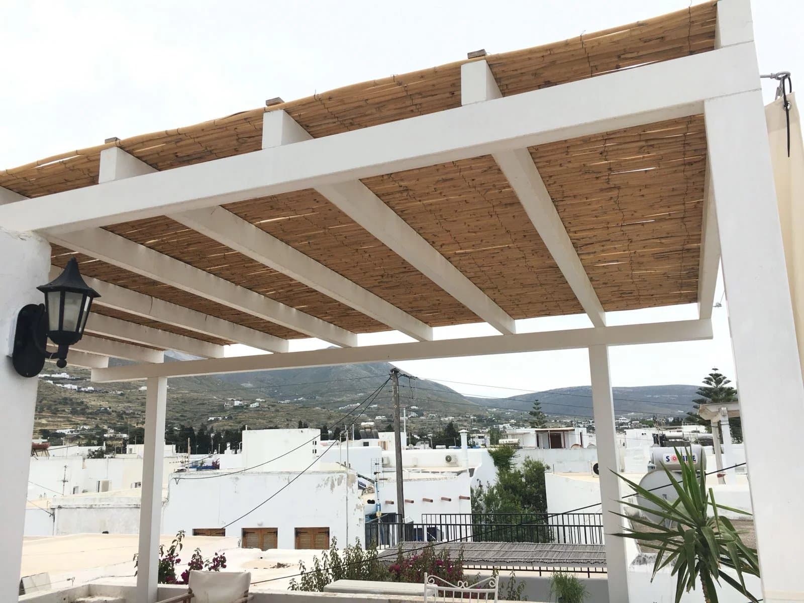 Traditional Cycladic Townhouse for Sale in the Heart of Parikia – Roof Terrace with Sea & Village Views - Image 17