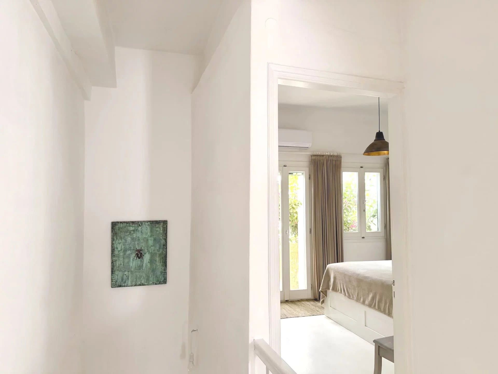 Traditional Cycladic Townhouse for Sale in the Heart of Parikia – Roof Terrace with Sea & Village Views - Image 7